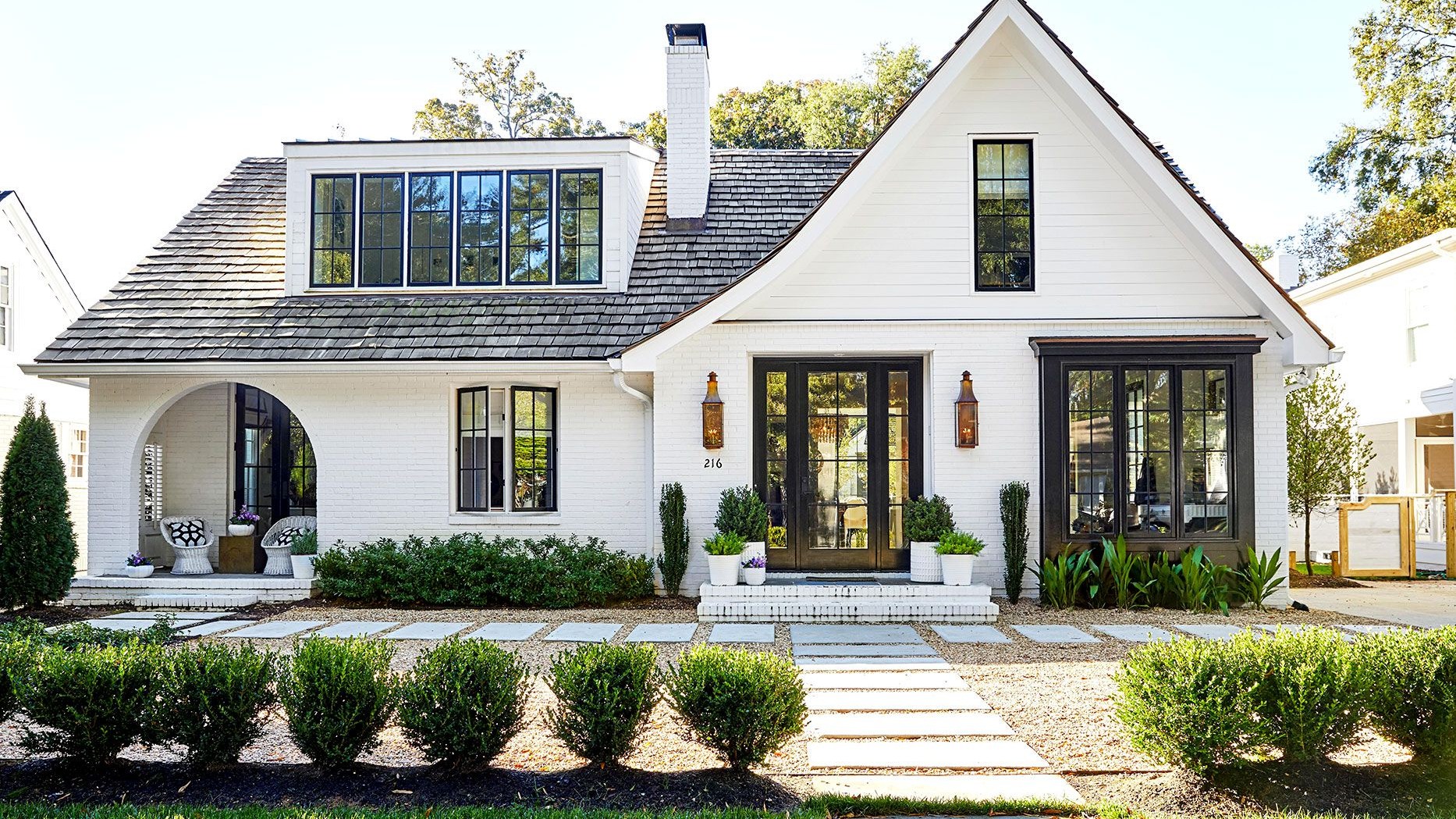 Whole-house renovation exterior with new windows